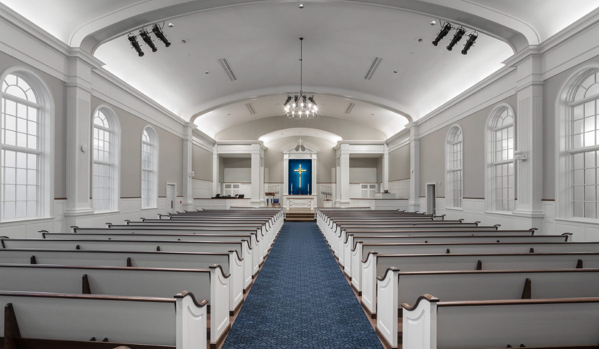 Interior of a Fox Point church in Milwaukee featuring elegant architecture, natural light, and detailed design elements.