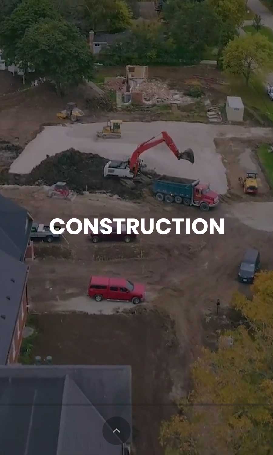 Drone Aerial View of Fox Point Lutheran Church Construction Near Milwaukee’s Lakefront Aerial drone view of construction site for Fox Point Lutheran Church near Milwaukee’s lakefront, with visible earth-moving machinery and groundwork preparation.