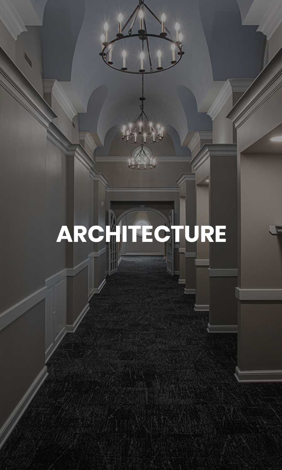 Interior of a modern cathedral in Fox Point, Wisconsin showcasing vaulted ceilings, stained glass windows, and architectural detail.