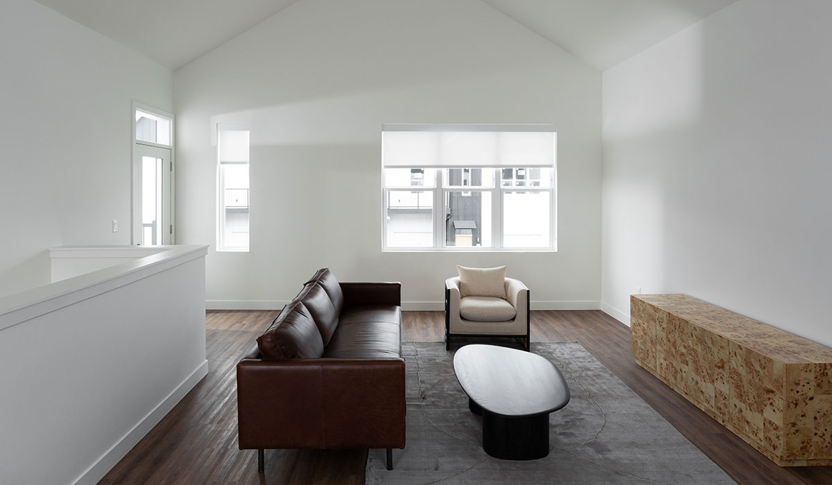 Modern 2nd Floor Loft at Emree Apartments Second floor loft with open railing, bright natural lighting, and modern finishes inside Emree Apartments in Milwaukee