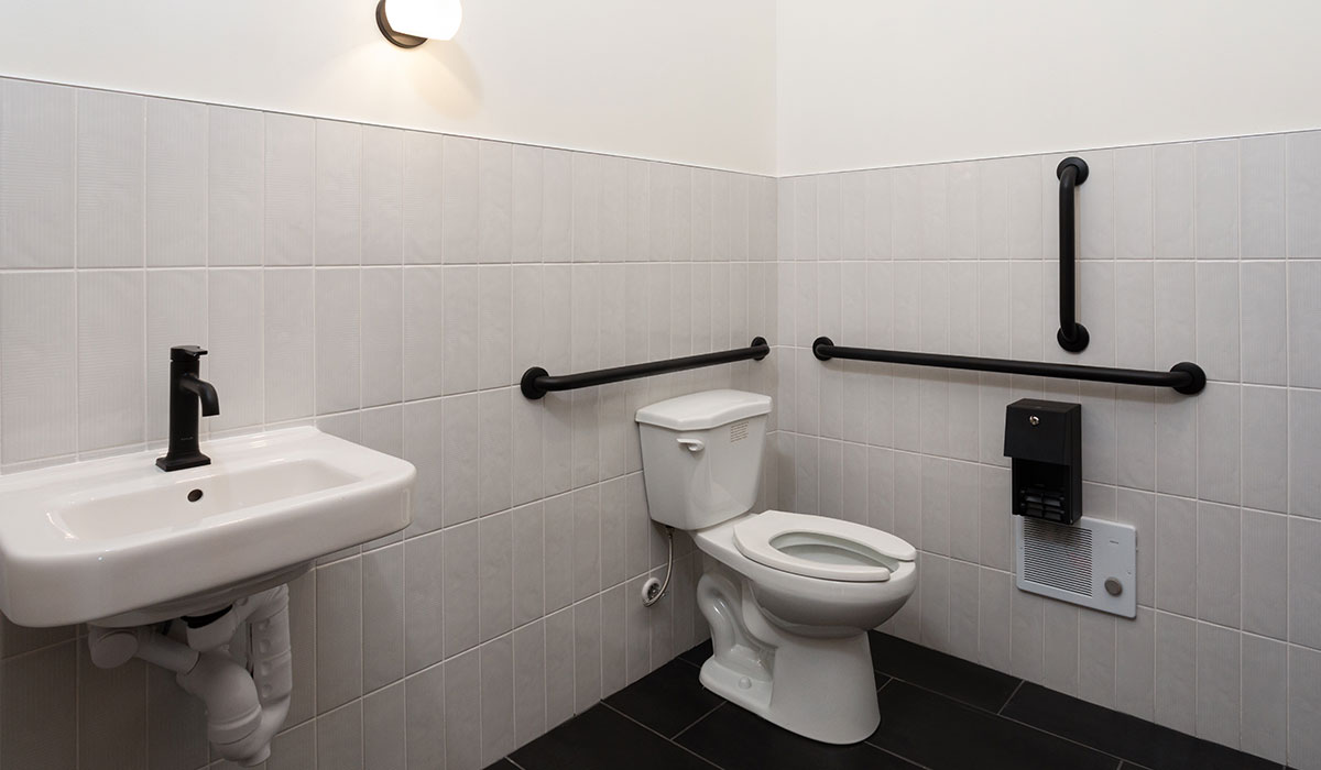 Modern Bathroom Interior – Emree Apartments Modern bathroom with sleek fixtures and bright lighting at Emree Apartments