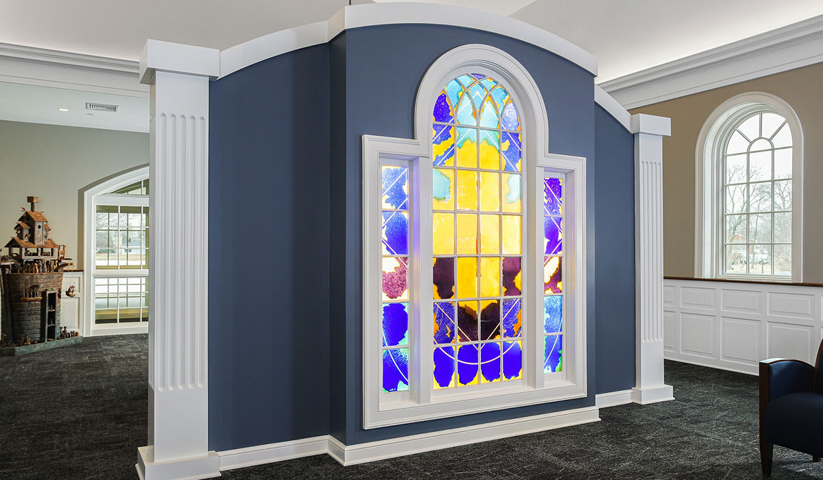 Interior Stain Glass Detail at Fox Point Lutheran Church Angle view of stained glass divider inside Fox Point Lutheran Church showcasing intricate colors and light patterns